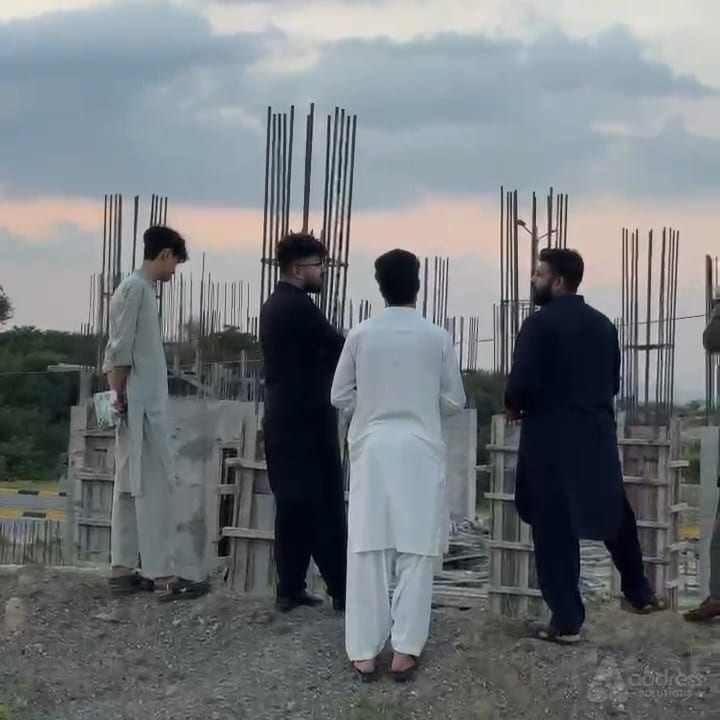 Team conducting an on-site project marketing visit at a construction site